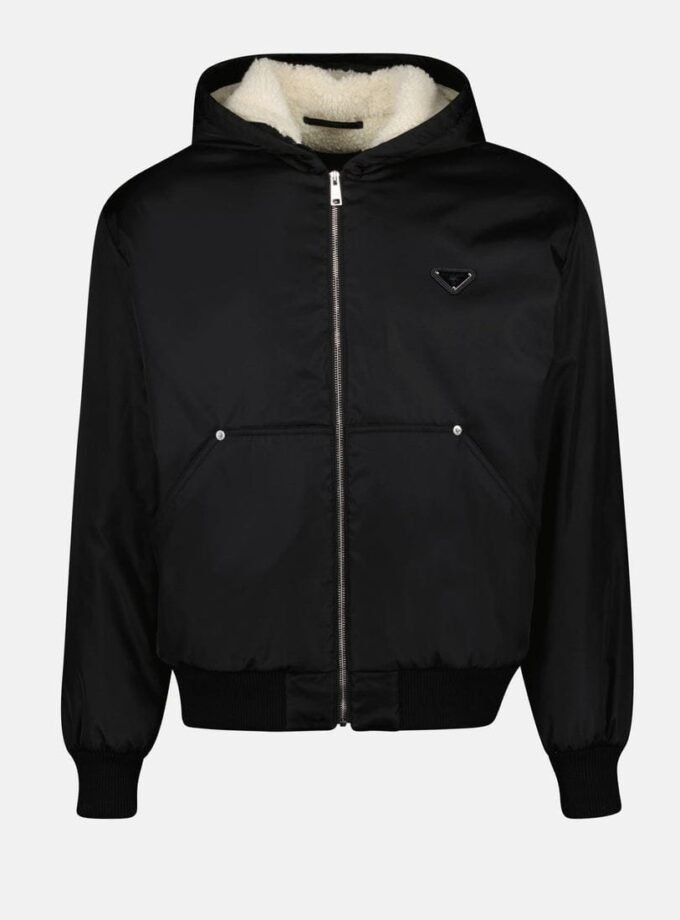 Black prada jacket with hood, full-length front zip, ribbed cuffs and hem, and light-toned hood lining